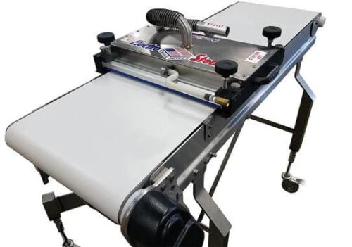 Electro-Steam clean-in-place conveyor cleaning system on white background